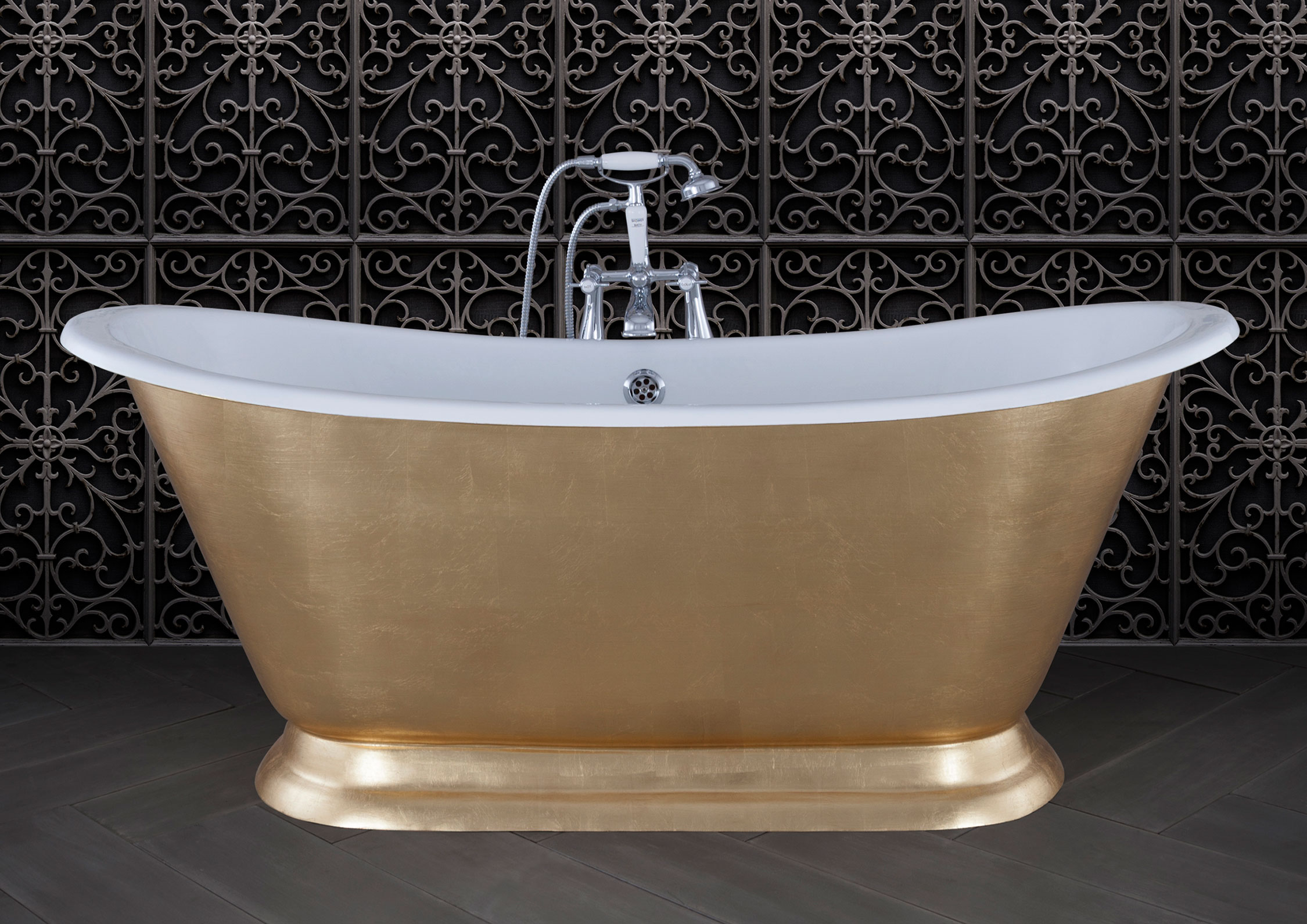 Cast iron bath with faux gold finish.