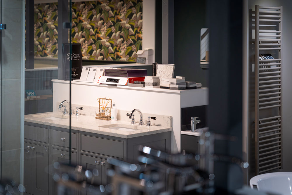 Showroom with sink area in background.