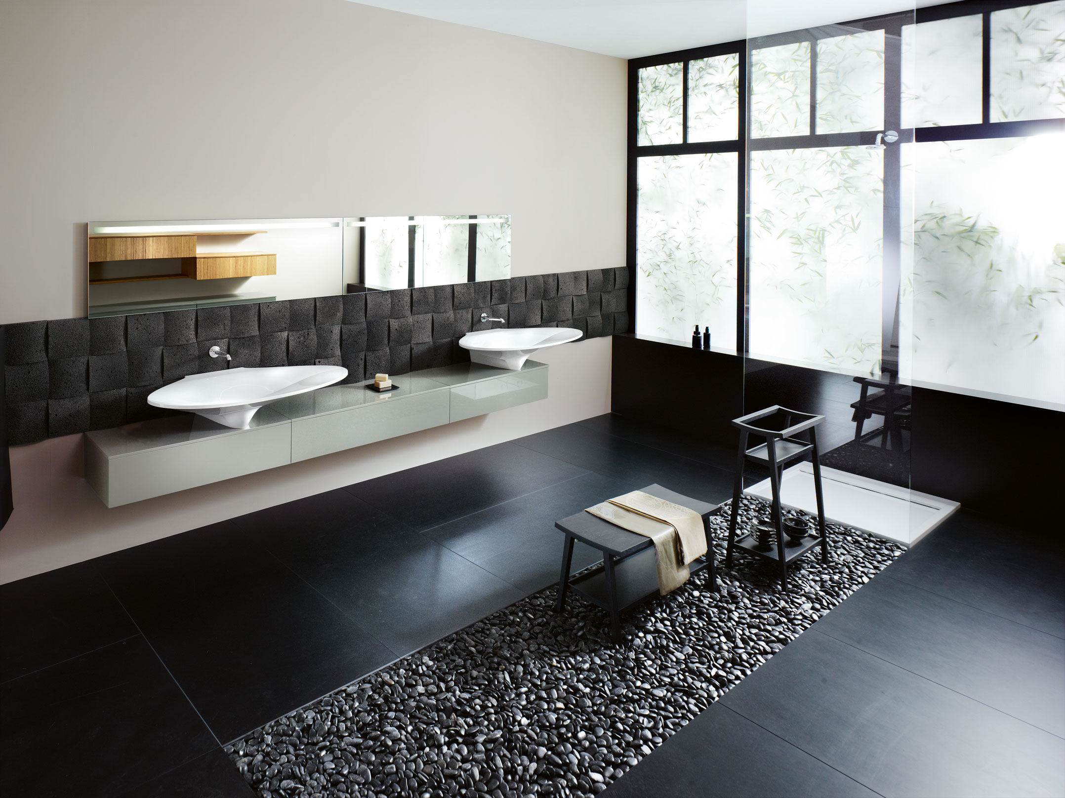 Large bathroom black flooring and modern basin design with mirrors.
